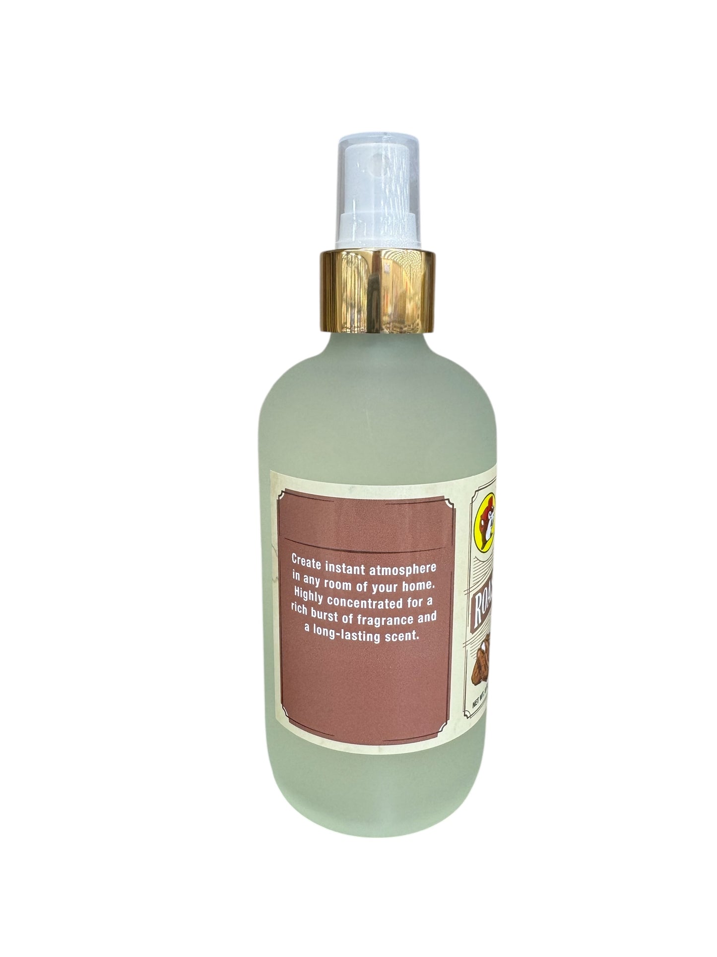 Frosted bottle with gold cap on a white background